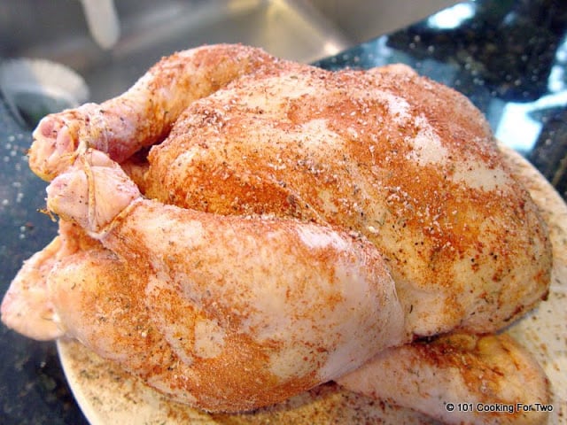 coat chicken with rub
