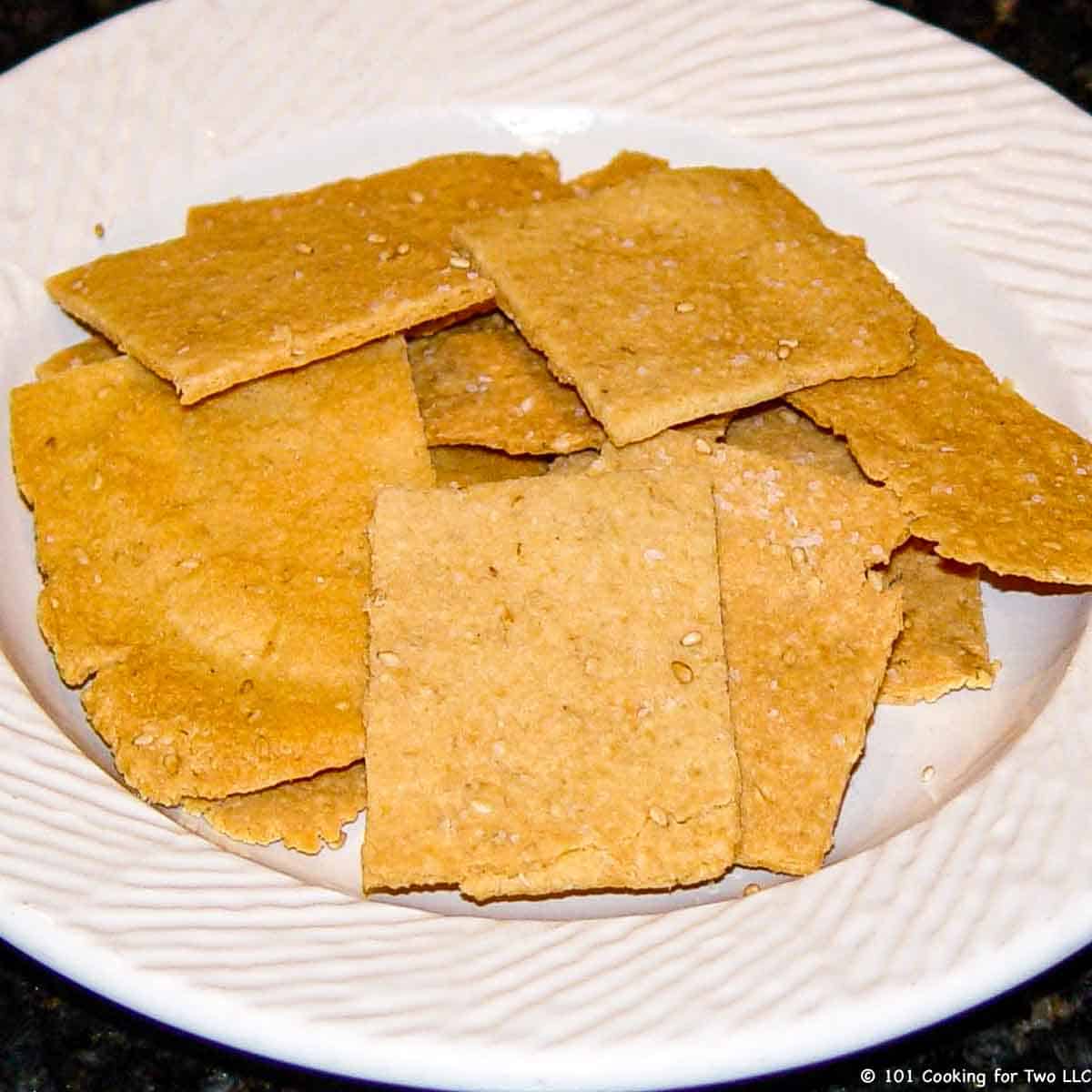 Parmesan Sesame Low Carb Crackers on a white plate