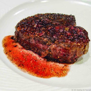 Steak Au Poivre on white plate