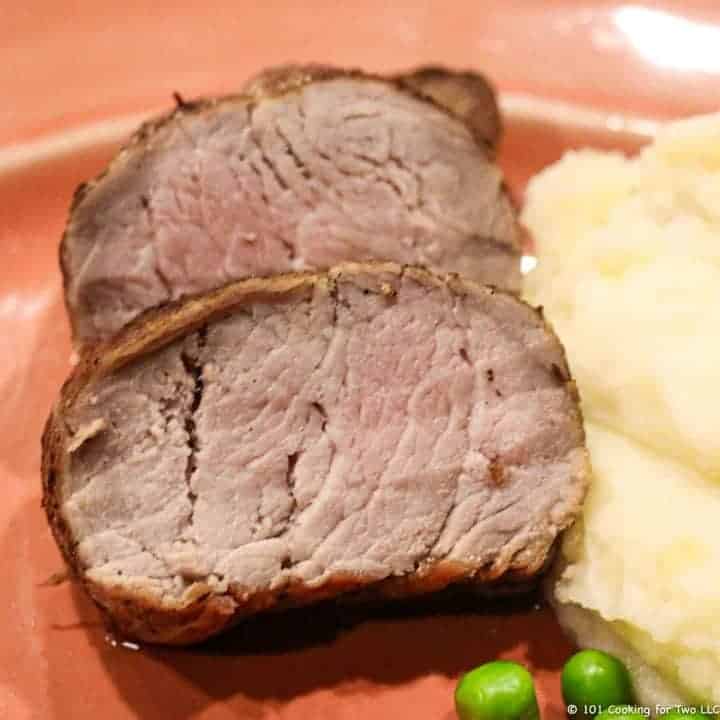 Pork Tenderloin slices on plate.