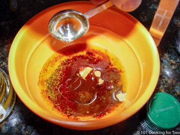 mixing honey glaze in a small bowl