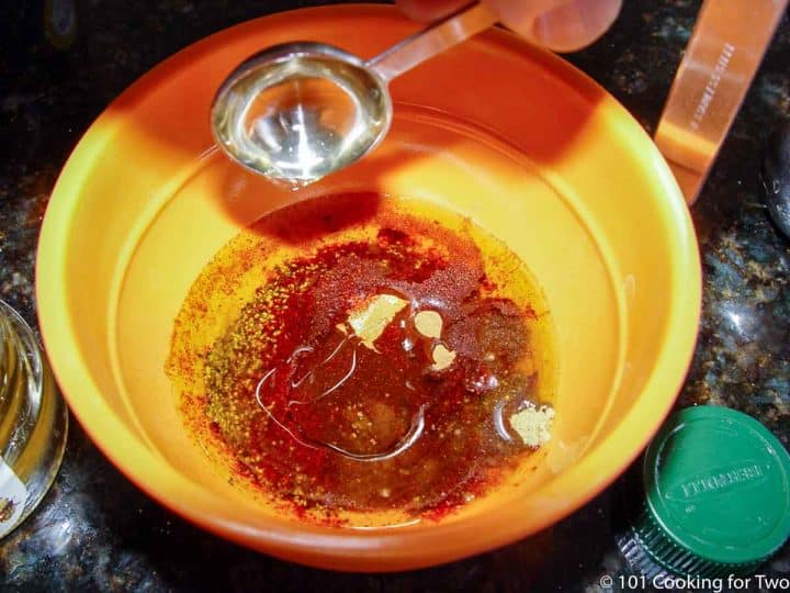 mixing honey glaze in a small bowl