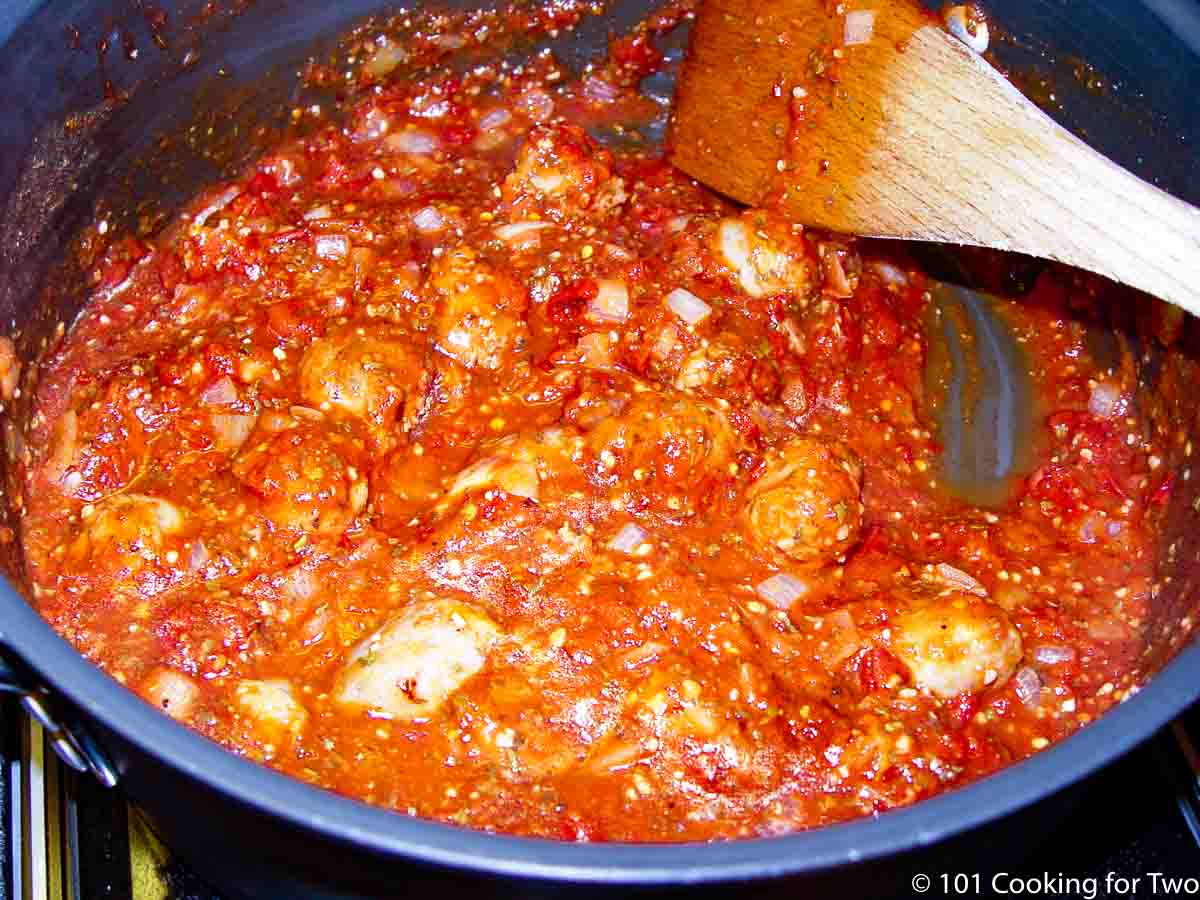 simmering sauce in the pan.