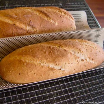 two loaves of multigran French bread