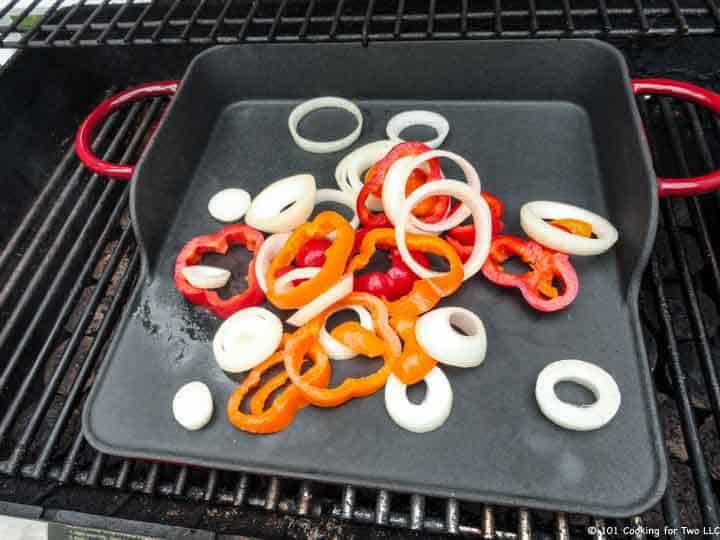 add veggies to the hot griddle,
