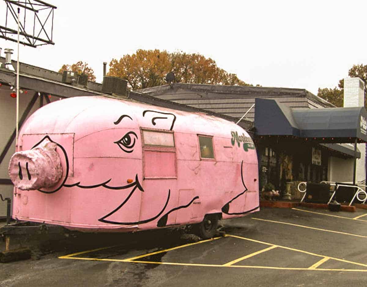 Marlowe's trailer that is a decorated as a pink pig