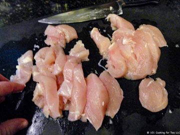 trim chicken breasts into strips