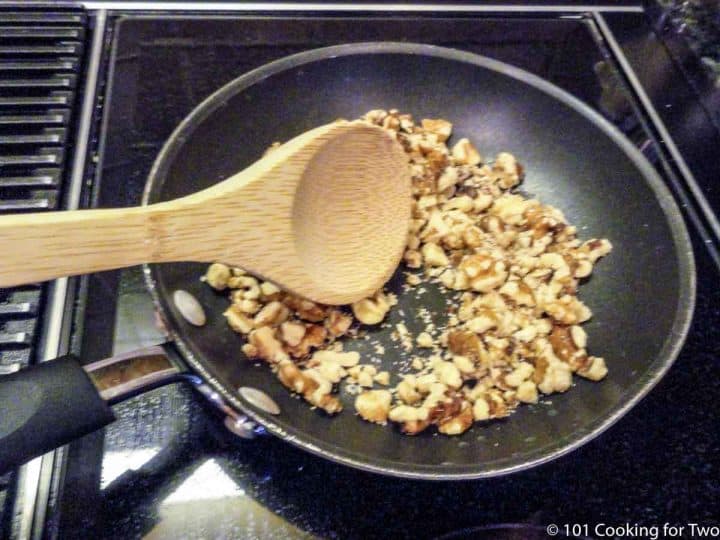 walnuts cooking in fry pan
