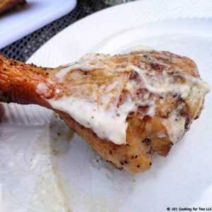 Alabama Chicken with white BBQ Sauce on chicken leg