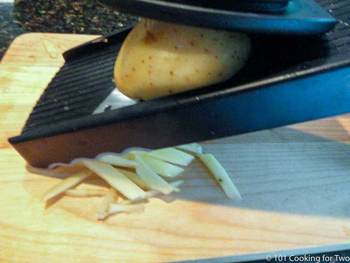 cutting fries with mandolin