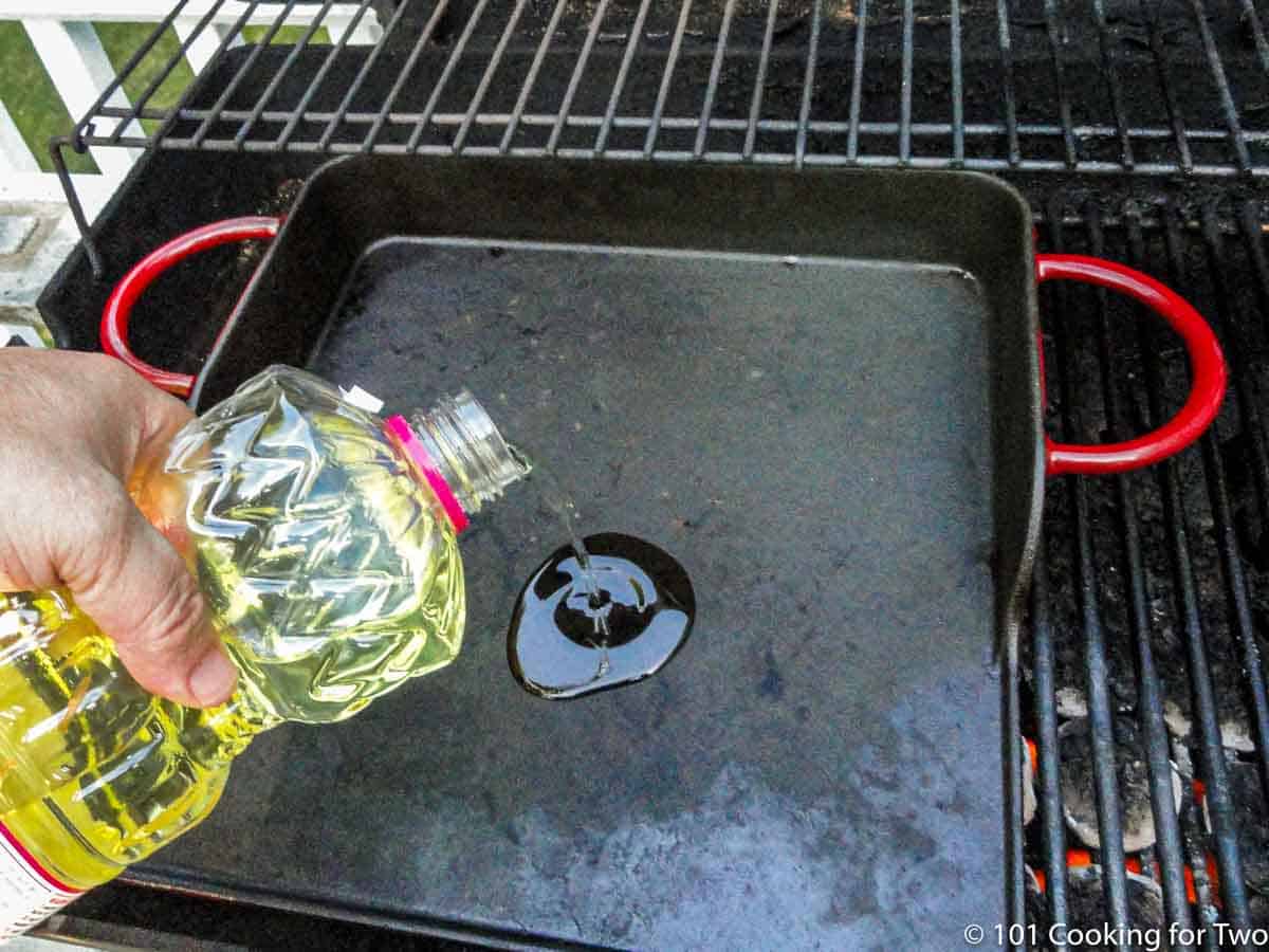 pouring oil on griddle