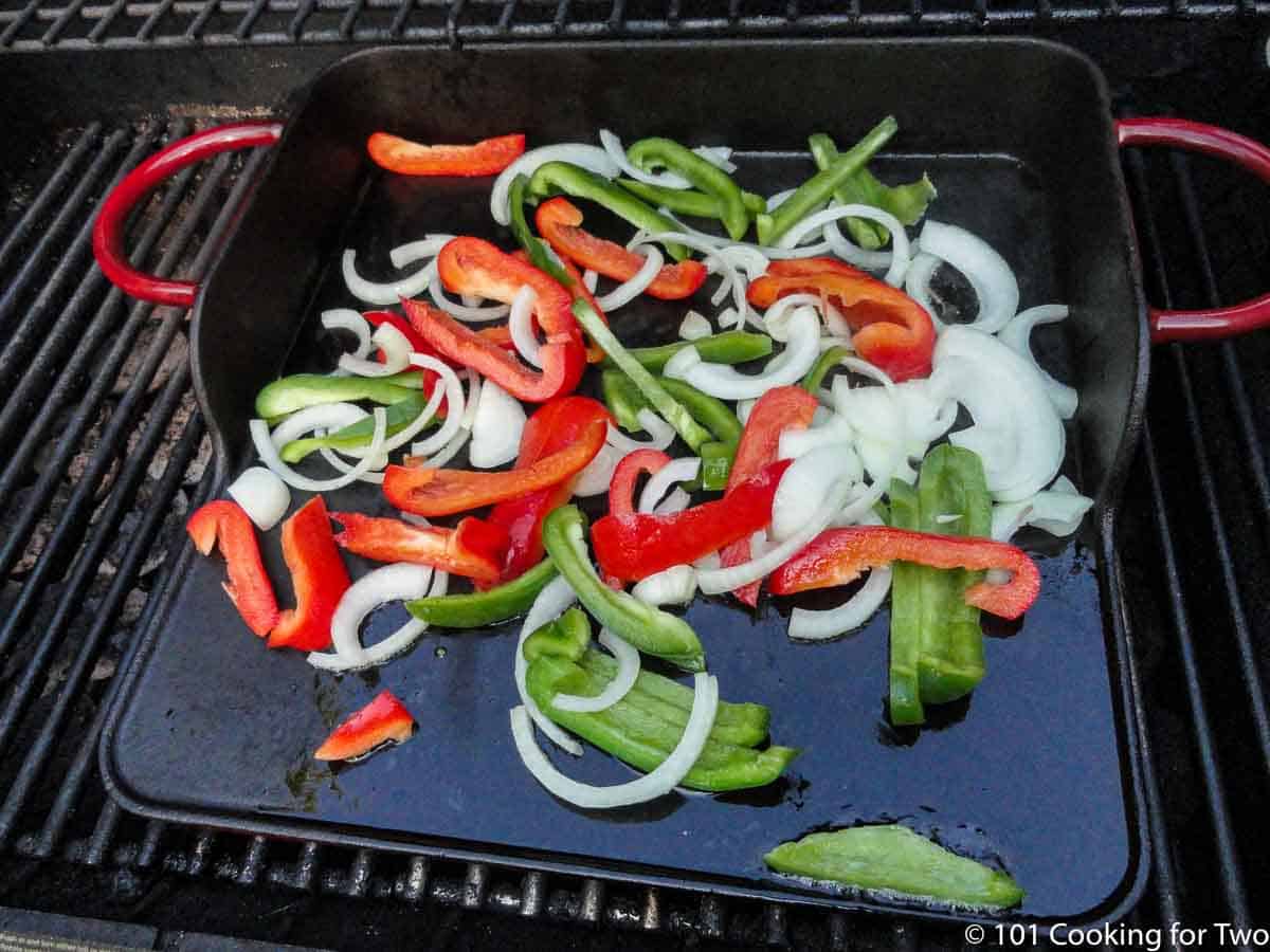 raw vegetables on griddle.