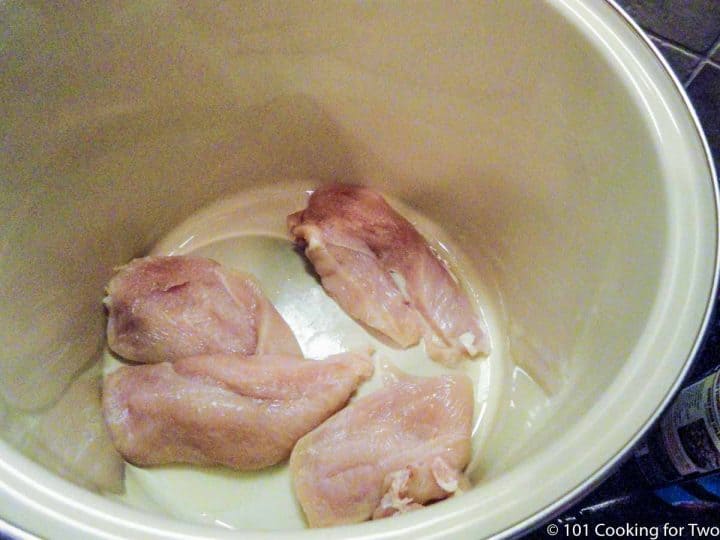 chicken in bottom of deep soup pot
