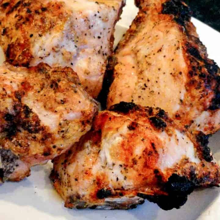 grilled pieces of split chicken breasts