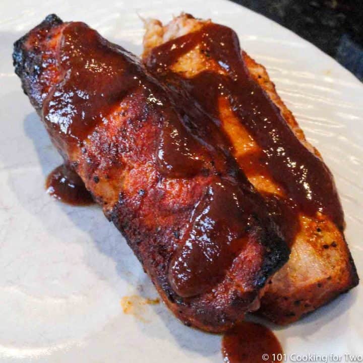 boneless ribs on plate with sauce