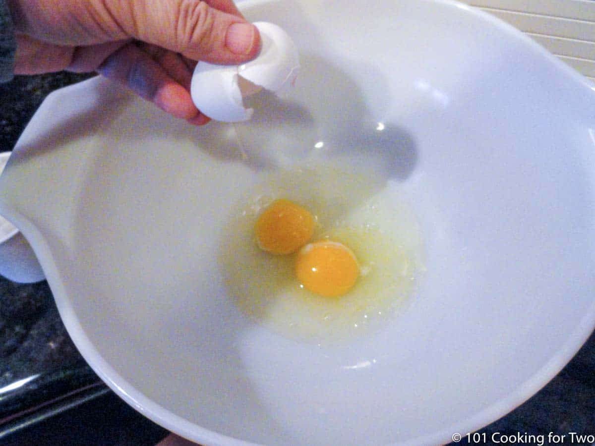 two eggs in white bowl