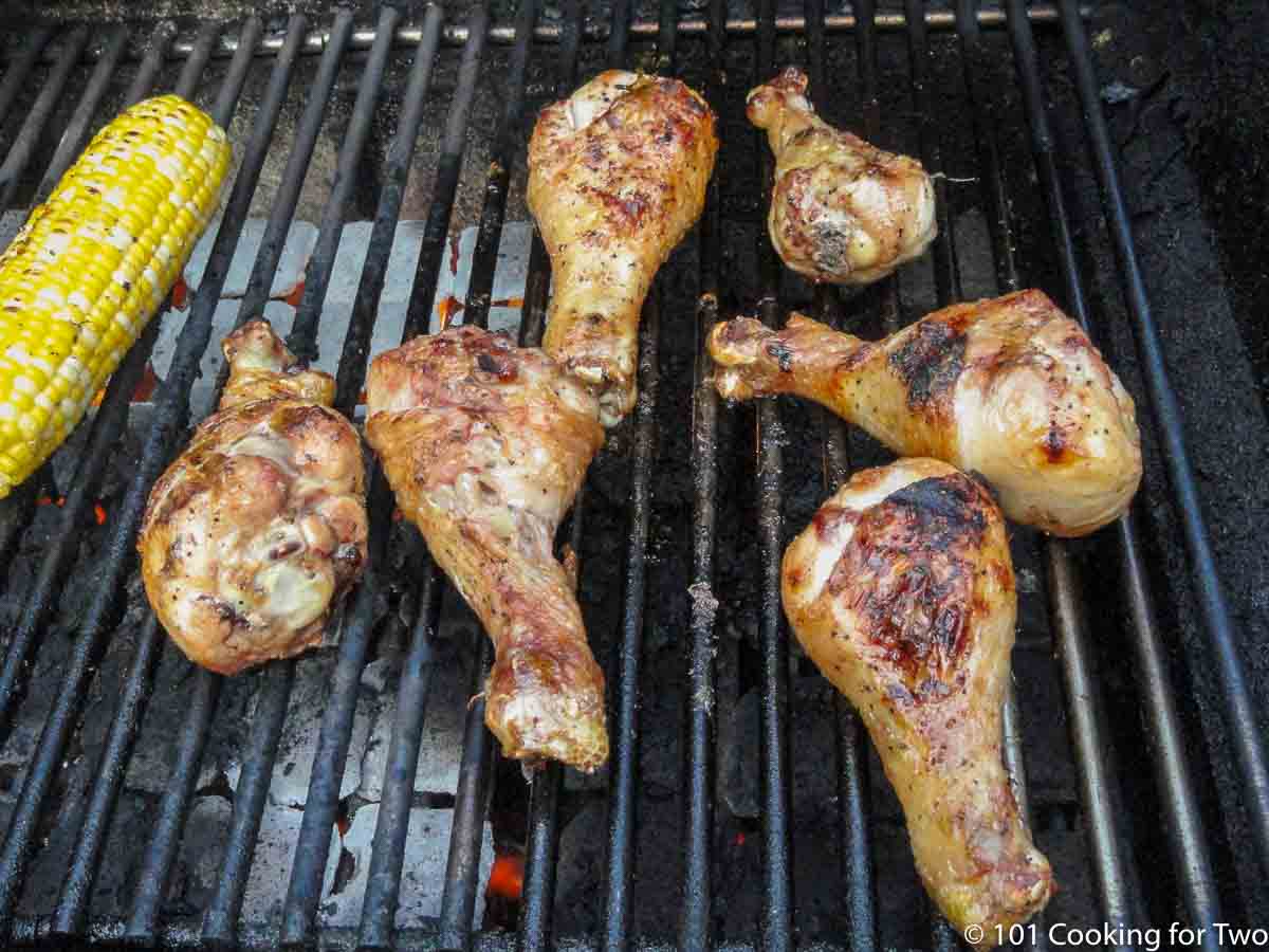 grilling chicken on grill grate