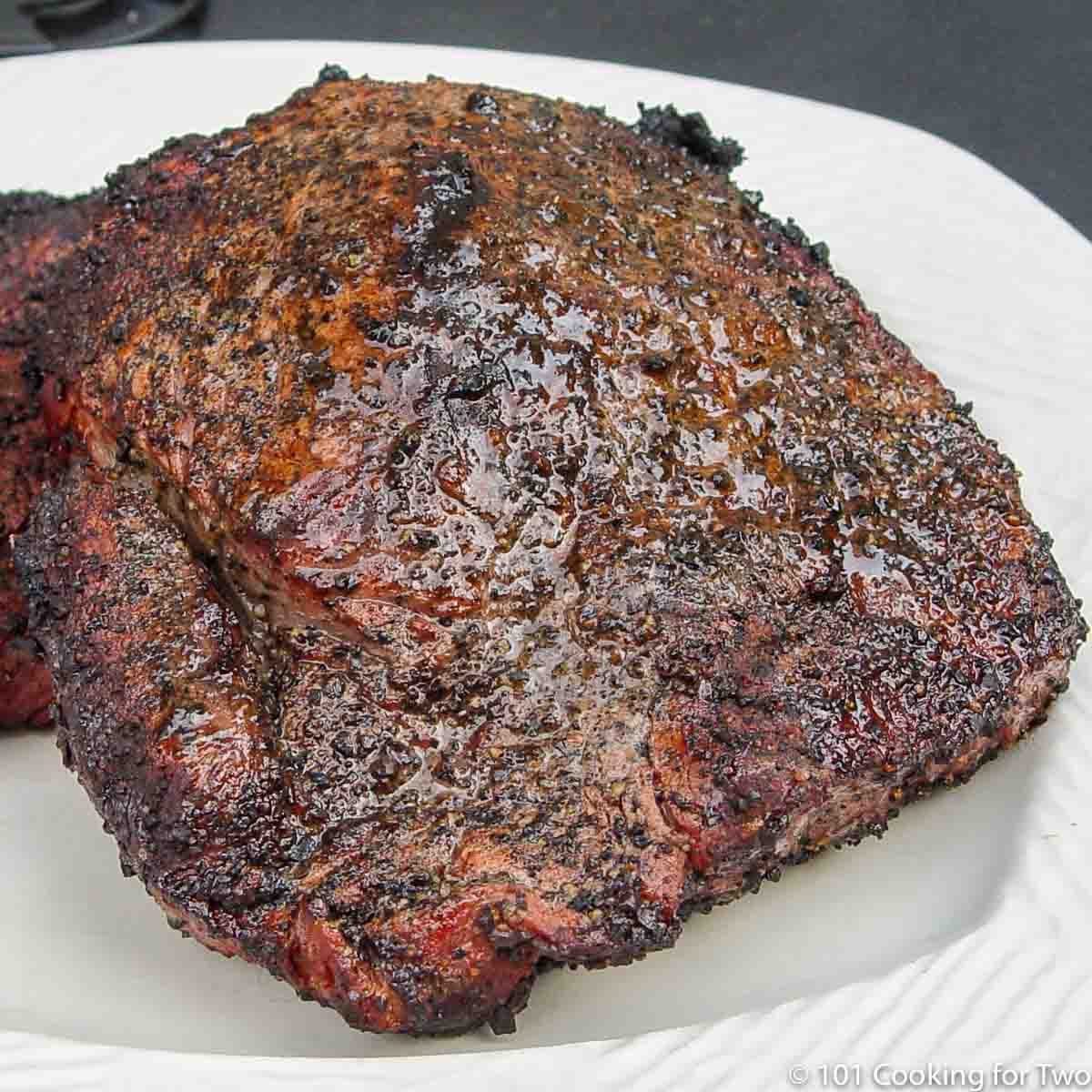 coffee rubbed sirloin on white plate