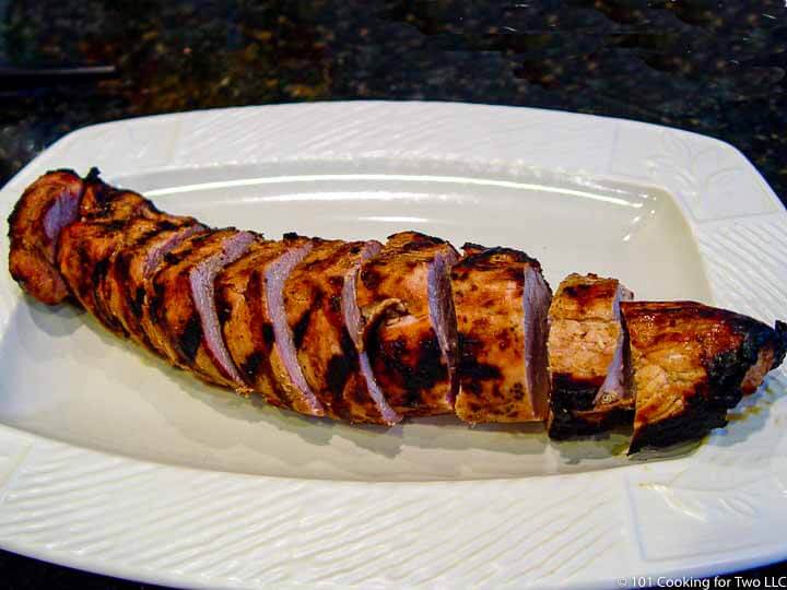 sliced tenderloin on white plater