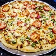 four cheese chicken pizza out of oven