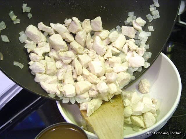 image of moving the cooked chicken to a bowl