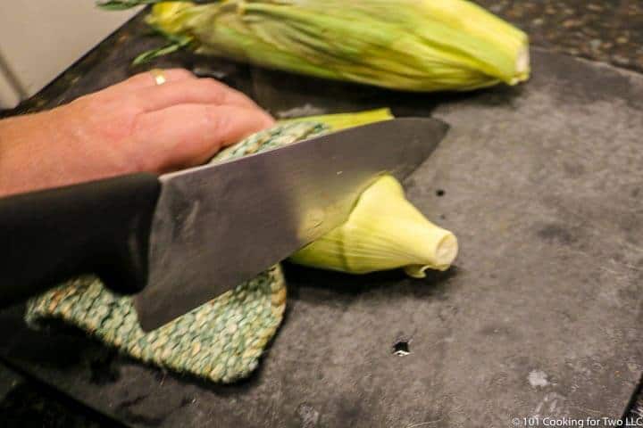 cut off end of corn.