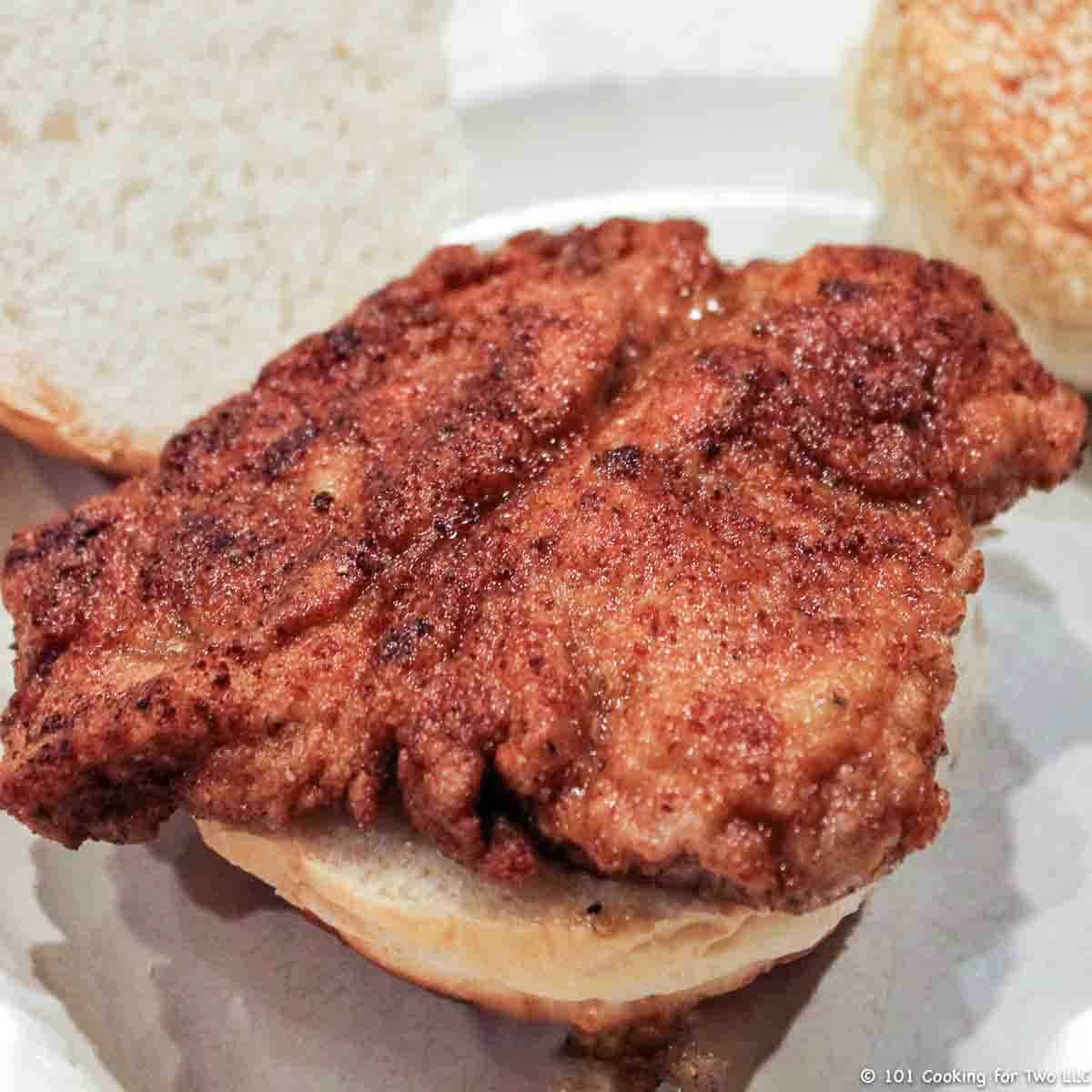 fried pork tenderloin on bun.