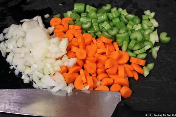 chopped veggies on black board