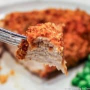 Parmesan crusted chicken on a fork