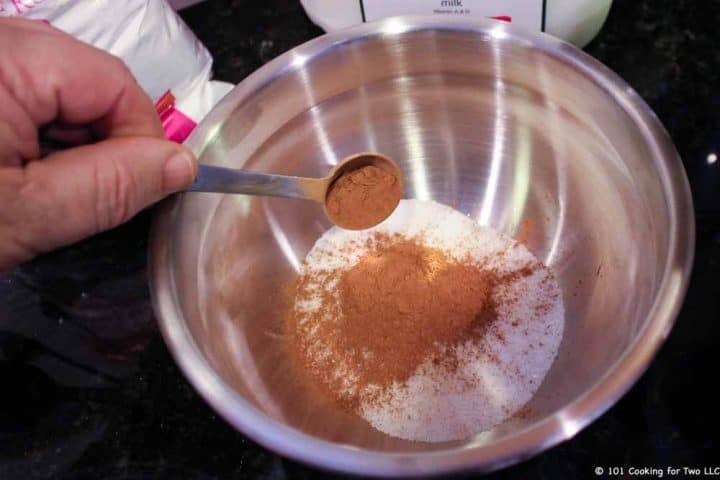 mixing cinnamon in sugar