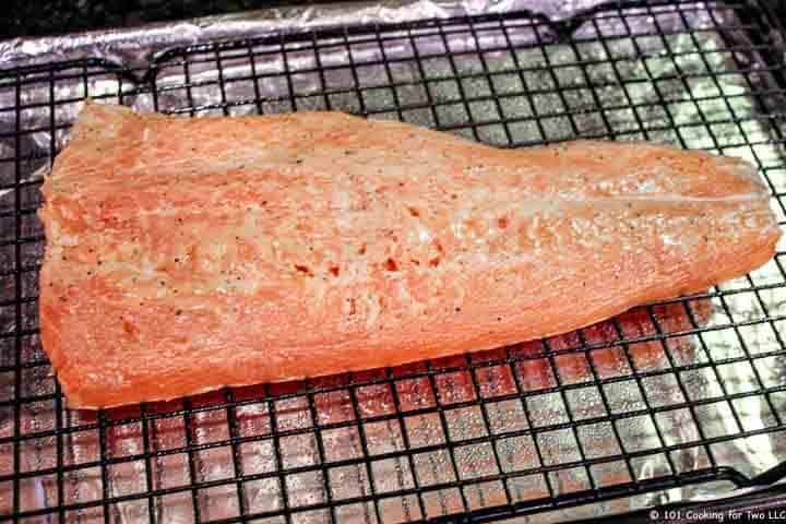 salmon on rack ready for oven.