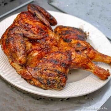 BBQ Butterflied Chicken on white plate