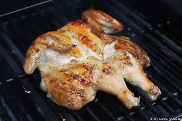 Browning chicken on grill
