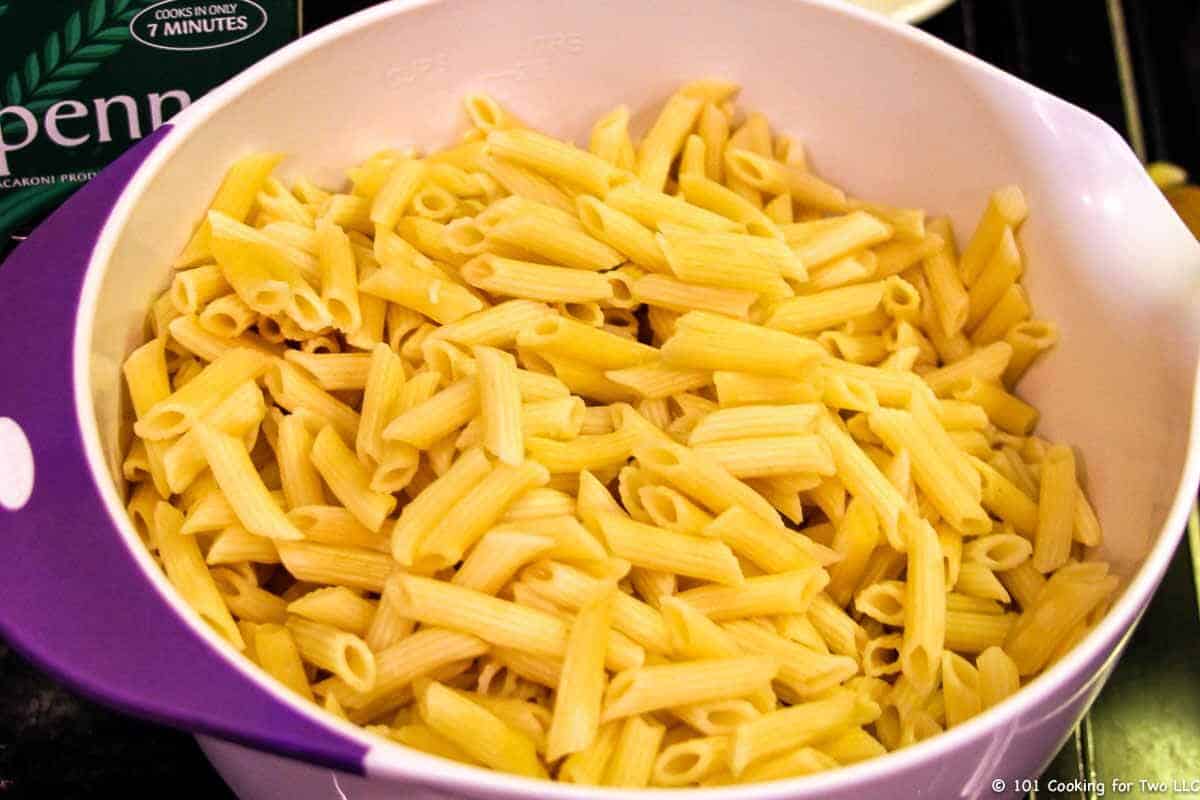 cooked pasta in white bowl.
