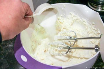 add sugar to bowl with beaters