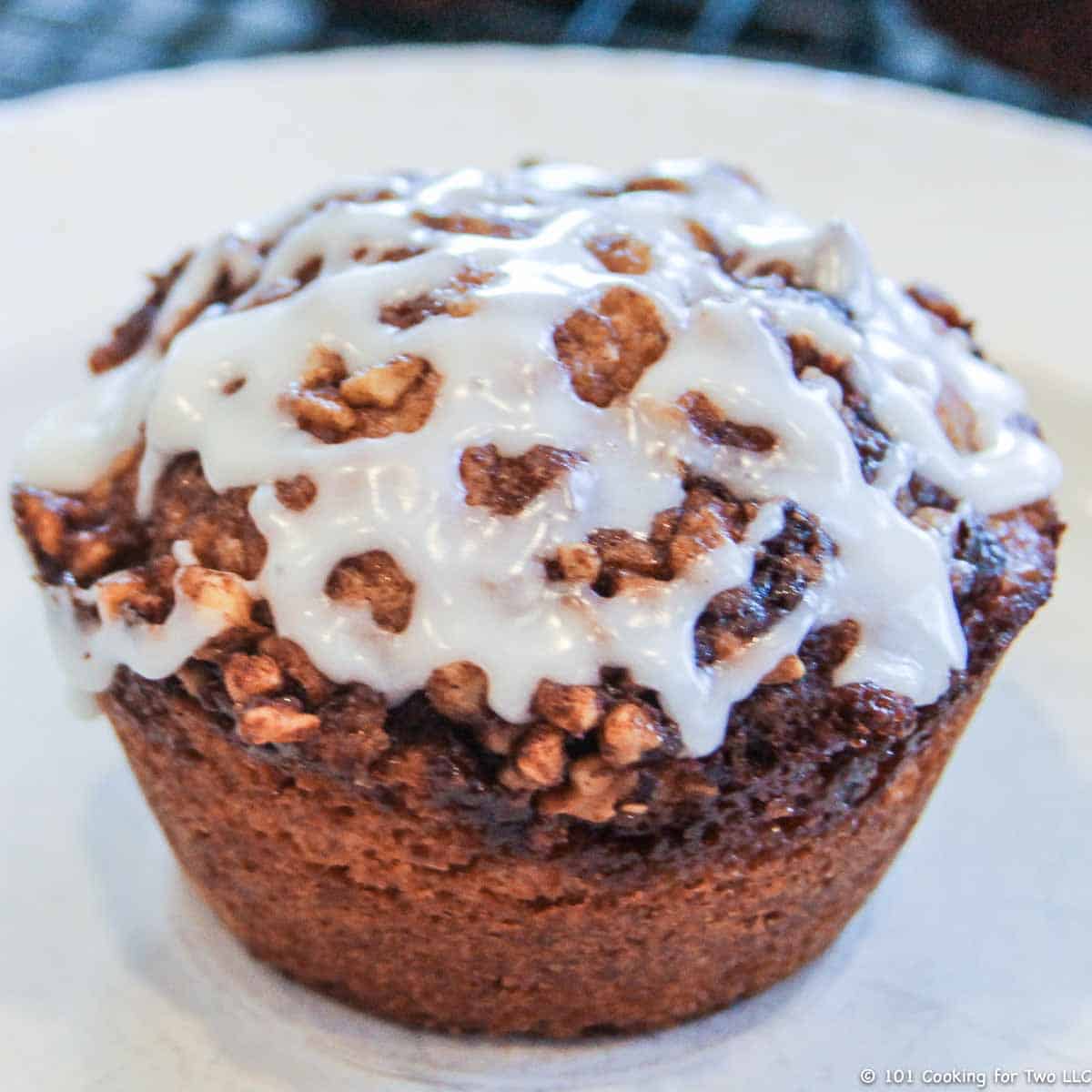cinnamon roll muffin in white plate