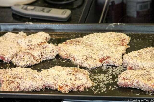 place tenderloins on tray with melted butter