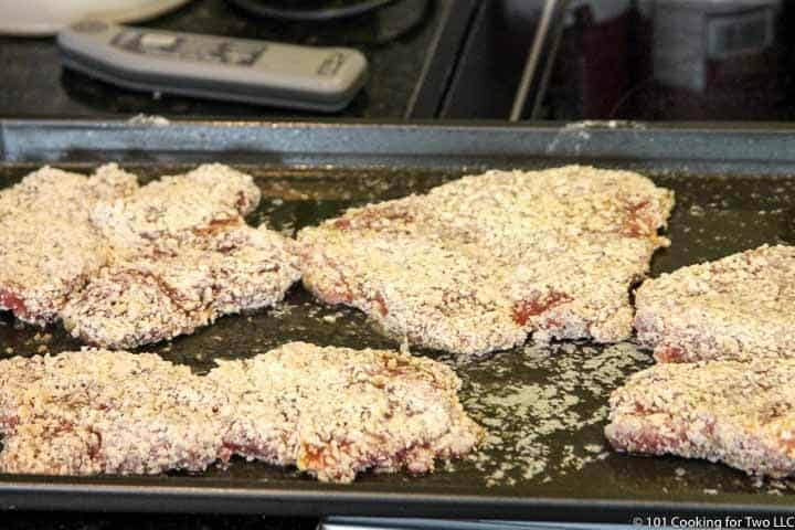 place tenderloins on tray with melted butter.