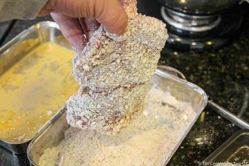 shaking off excess coating