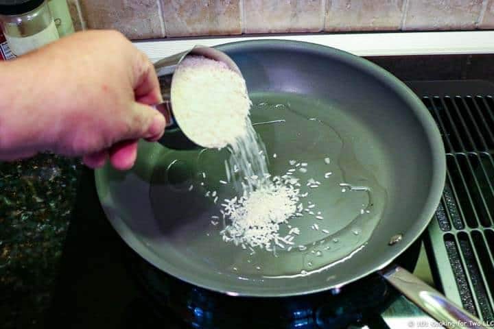 add rice to hot oil