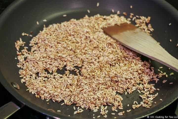 browned rice in pan