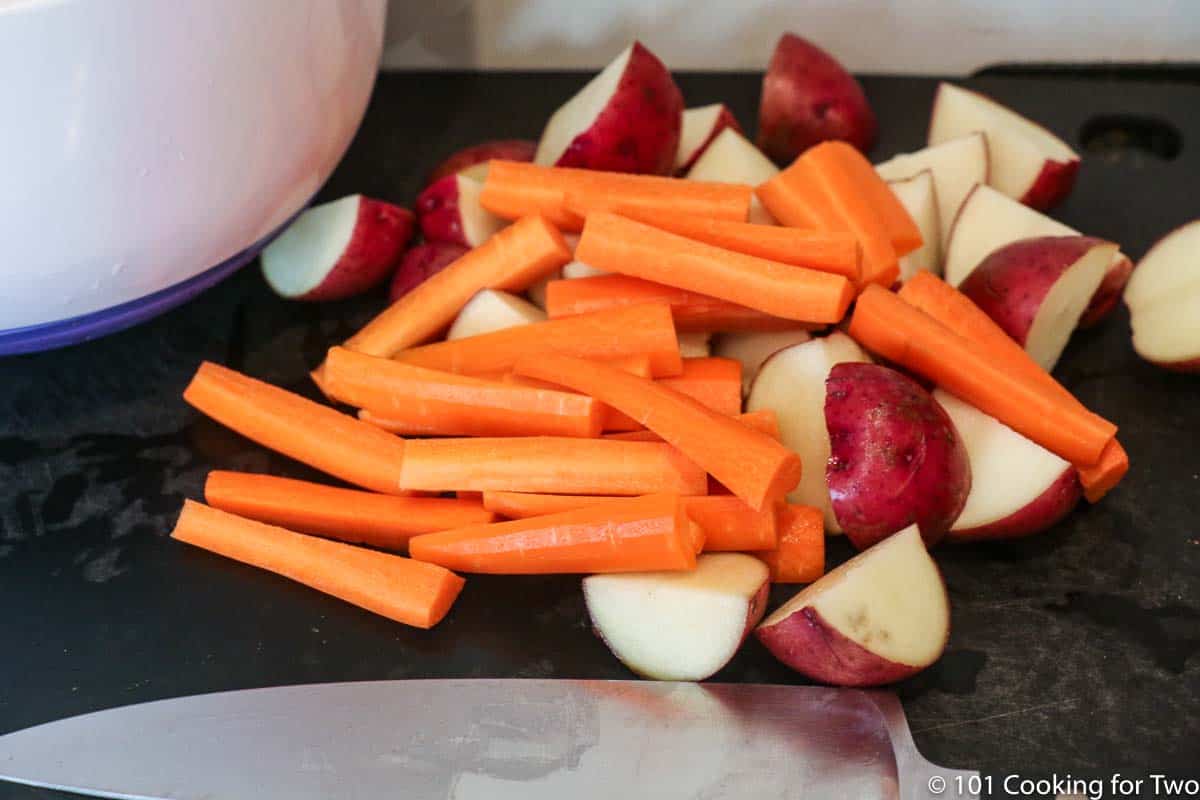 cut up potatoes and carrots