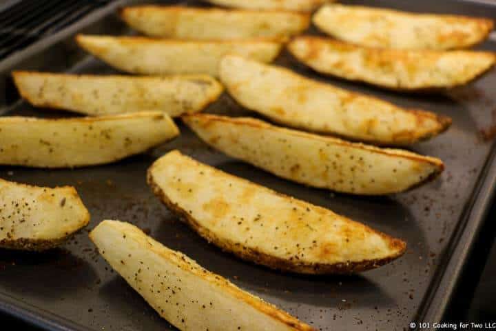 browned Parmesan Potato Wedges on tray