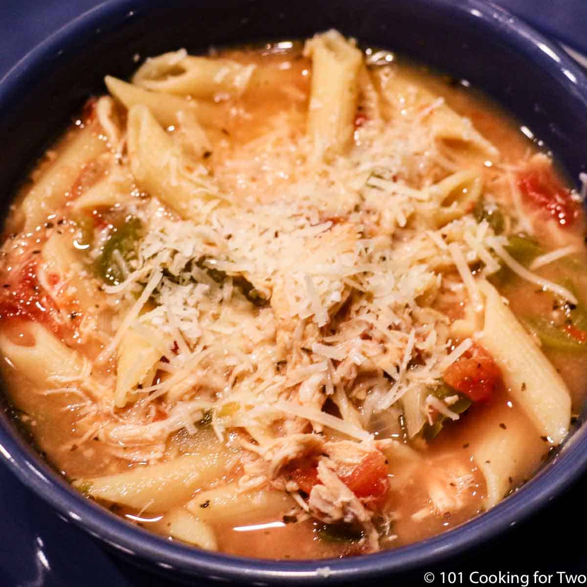 Image of Chicken Parmesan Soup in a blue bowl