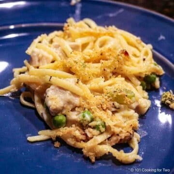 large serving of turkey tetrazzini on a blue plate