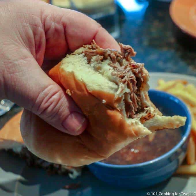 image of French Dip sandwich with bite out of it