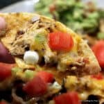 Image of Chicken and Black Beans on a Nacho Chip