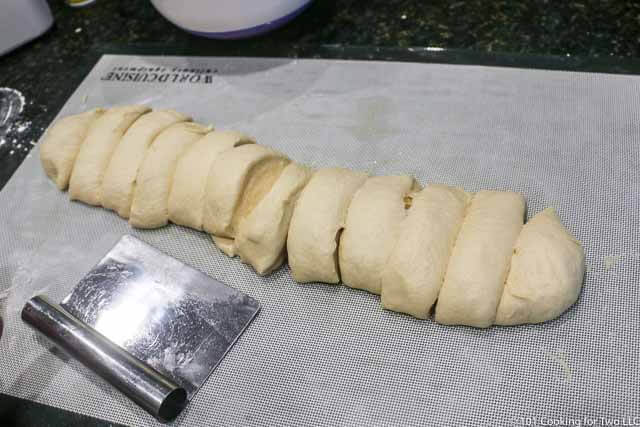 image of cutting the dough into 12 rolls