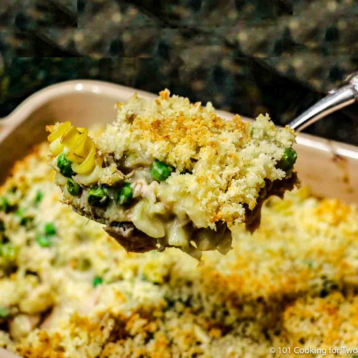 Tuna Noodle Casserole in a large spoon.