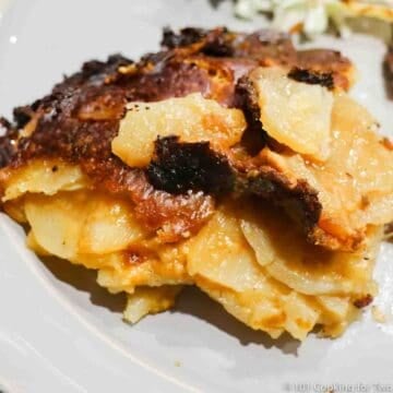 Scalloped Potatoes on white plate